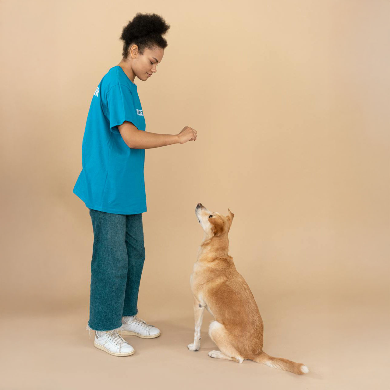 Photo of a great trainer with a dog.